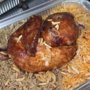 نص دجاجة مع رز — بيسترو عرفات